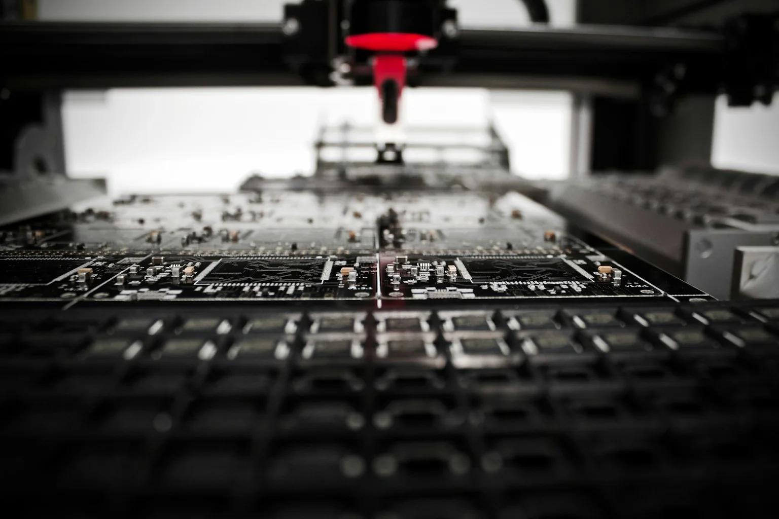 Automated assembly equipment working over populated circuit boards